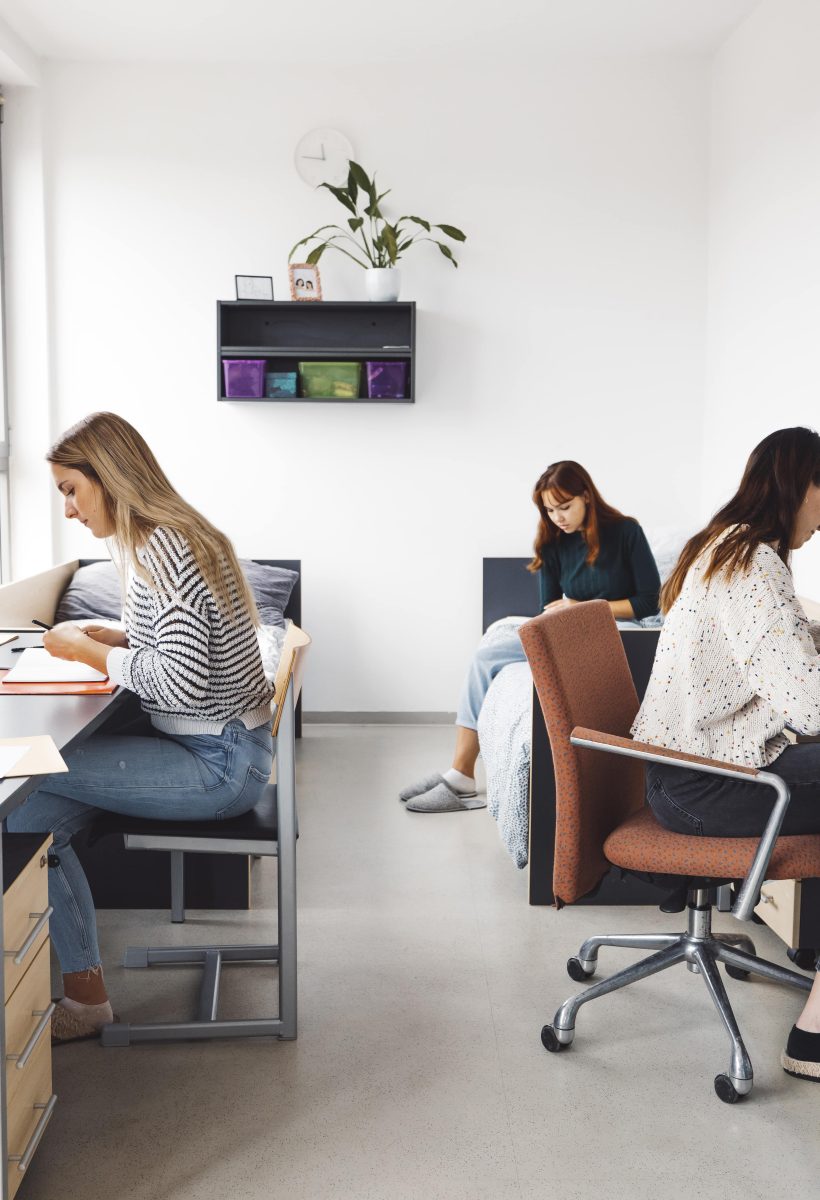 college-students-studying-in-their-dorm-room-2022-12-17-00-06-13-utc-min